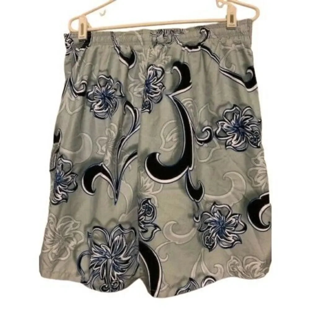 SPEEDO SIZE LARGE FLORAL SWIM TRUNKS